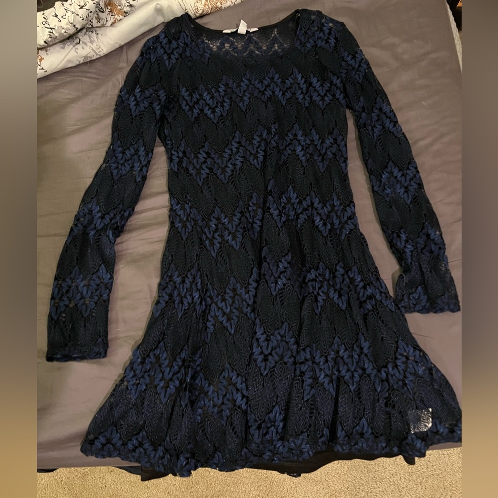 Long sleeve navy blue dress.